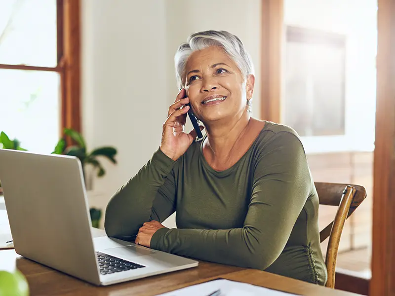 older woman talking on phone